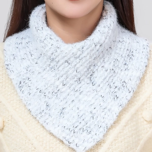 Close-up of a warm white mottled knit triangular neck warmer for women's winter outfits.