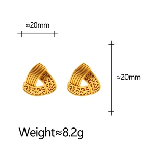 Vintage gold-toned triangular leopard print stud earrings with vertical ribbed texture