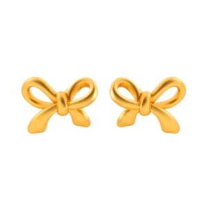 Minimalist matte gold bow stud earrings with a frosted finish on a clean white background