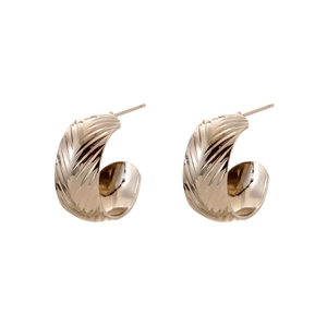 Boucles d'oreilles créoles géométriques vintage en or café avec texture en spirale