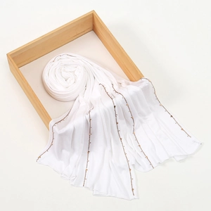 Premium white modal hijab with elegant vertical gold sequins and beadwork detail