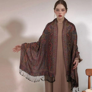 Elegant paisley jacquard shawl with fringe edges and vintage bohemian pattern details