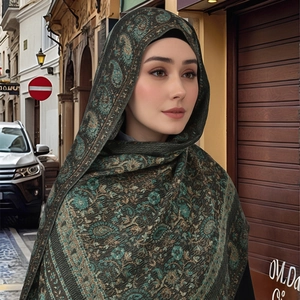 Ethnic paisley tassel shawl scarf in vintage green with intricate woven floral patterns