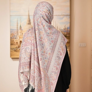 Elegant paisley patterned shawl with fringe tassels for women in cream and pink tones