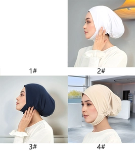 Detail of elastic milk silk undercaps with chin wrap and pleated back in various colors
