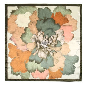 Detail of a large square satin scarf with vintage floral patterns in green and orange