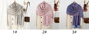 Three elegant paisley tassel scarves in blue and purple tones for autumn and winter outfits