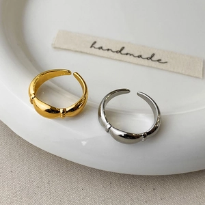Minimalist adjustable open rings in gold and silver finish with textured dot details