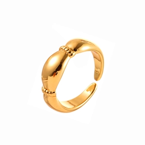 Elegant gold-plated open ring with retro textured knot detail on a polished band