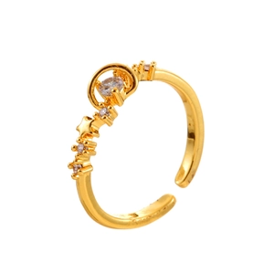 Minimalist adjustable gold star ring with sparkling cubic zirconia on white background