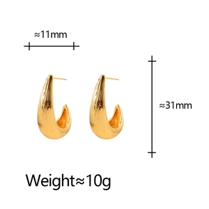 Boucles d'oreilles minimalistes dorées en forme de goutte avec texture brossée