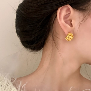 Elegant woven hollow gold ball stud earrings for women in a luxury minimalist style