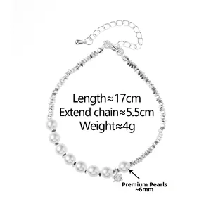 Macro shot of elegant bracelet featuring bright pearls and silver faceted beads