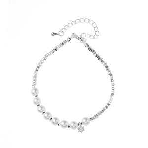 Elegant pearl and silver bead bracelet with a sparkling zircon pendant on white background