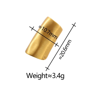 Detailed view of gold brushed metal ear cuff with size specs 10.7mm x 20.6mm