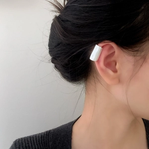 Minimalist wide rectangular cream white ear cuff in a brushed light luxury style