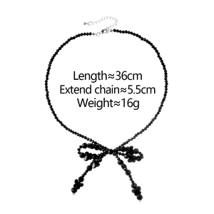 Chic collier de perles noires avec pendentif nœud en cristal et chaîne en argent ajustable