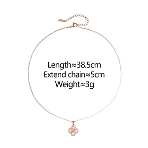 Detail of rose gold clover bracelet showing micro-pave zircon edges and branded clasp