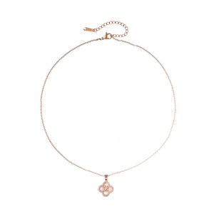 Detail of rose gold clover pendant with pink shell inlay and micro-paved zircons