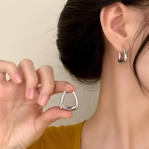 Minimalist silver geometric U-shaped hoop earrings for women in polished finish