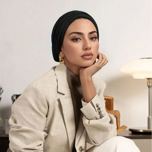 Detail showing high-elastic breathable black turban on model with premium matte texture