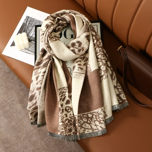 Chic leopard print cashmere scarf with tassel edges and thick patchwork design