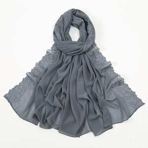 Detailed view of grey chiffon scarf with elegant rose embroidery, soft and lightweight.