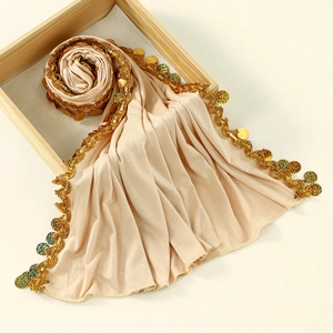 Elegant beige mercerized cotton hijab featuring intricate gold sequin and bead lace trim