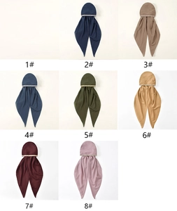 Detail view of ethnic style headscarf color options with sequin borders and long tails