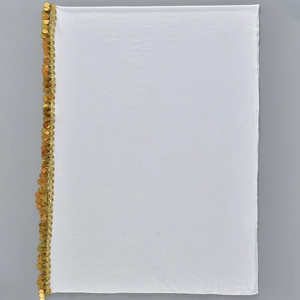 Detail of white mercerized cotton scarf with gold sequins and fringe embroidery