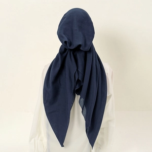 Detail view of navy blue ethnic hijab showing soft fabric drape and texture at the back