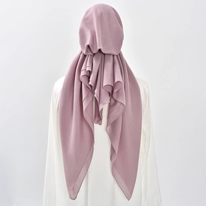 Detail of mauve ethnic hijab showing draped texture and back hanging style