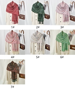 Detailed grid showing seven color variations of paisley print tassel scarves for women