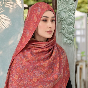 Elegant paisley patterned long scarf for women with tassels in dark red and orange tones