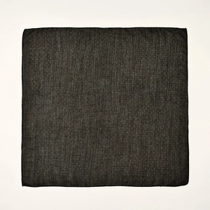 Macro view of black pocket square with white polka dot stripe patterns and neat stitching