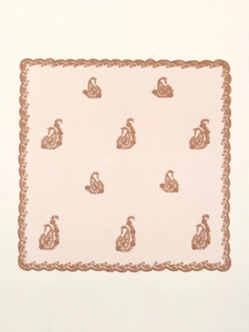 Detail of light pink floral lace headscarf with copper scalloped edges and paisley embroidery