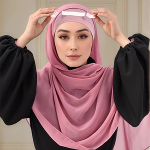 Close-up of a pink chiffon hijab with an internal white styling strip for secure fixing