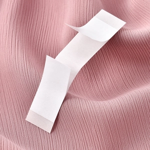 Pink ribbed knit fabric with white adhesive non-slip strips for hijab and scarf fixing
