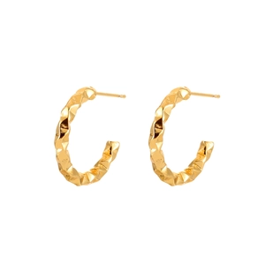 Minimalist golden C-shaped hoop earrings featuring unique irregular hammered metal texture