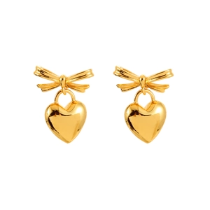 Elegant gold bow earrings with heart-shaped pendants on a minimalist white background