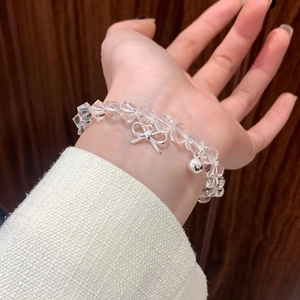 Elegant beaded bracelet with crystal beads and silver bow charm for women's daily wear