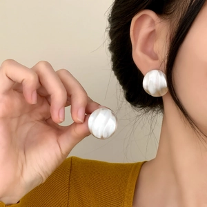 Chic round earrings with French pleated texture and brushed silver finish for women