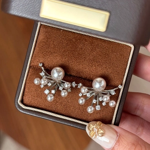 Irregular fireworks pearl stud earrings with zircon micro-inlays in silver finish