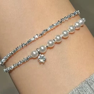 Double-layer silver beaded bracelet with elegant pearls and a sparkling zircon pendant