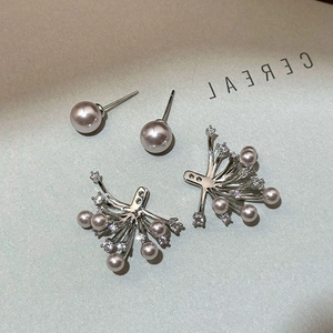 Irregular pearl and zircon firework stud earrings in a minimalist fan-shaped silver setting