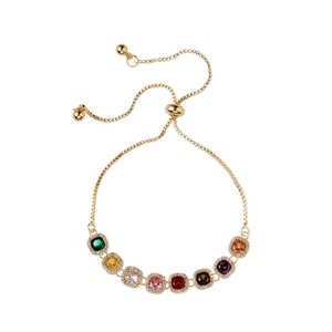 Bracelet doré réglable avec pierres carrées colorées et pavé de cristaux brillants