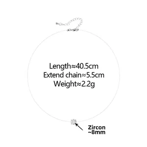Detailed view of invisible nylon necklace with 8mm round zircon pendant and silver clasp