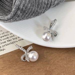 Élégant Nœud Boucles Oreilles Künstliche Perles Micro Pavé Zircon Cuivre Bijoux Pour Femmes Doux Mode Accessoires