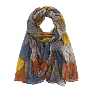 Close-up of lightweight floral voile scarf with abstract leaf prints in warm neutral tones