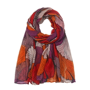 Close-up of lightweight voile scarf featuring vibrant floral ginkgo patterns in red and purple